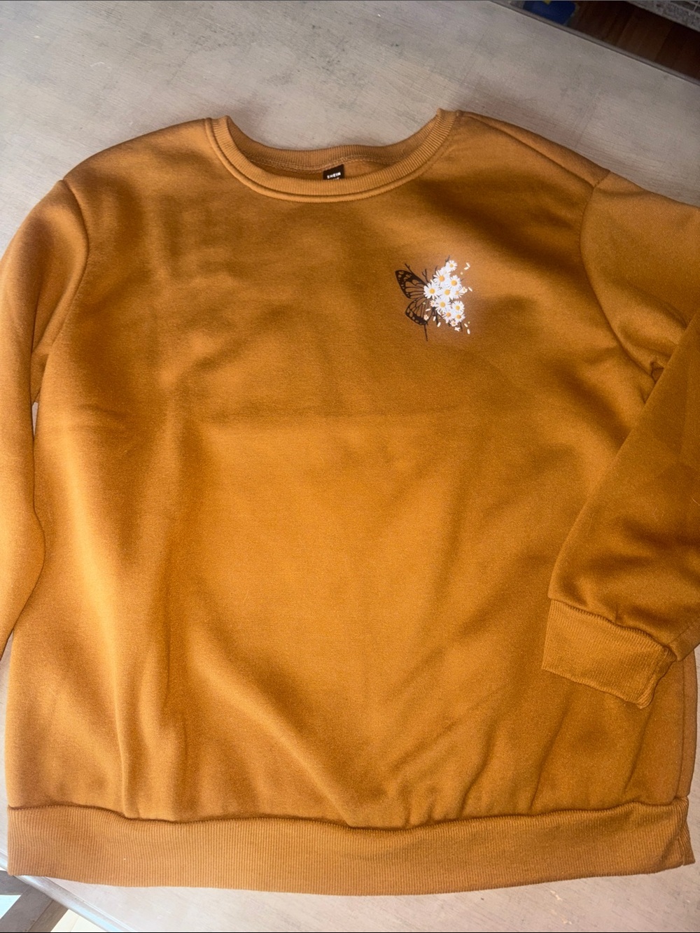 Women’s Brown Crewneck Sweater with Subtle Butterfly Detail